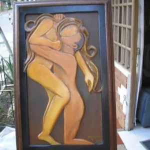 Cuadro artÃstico tallado manualmente
