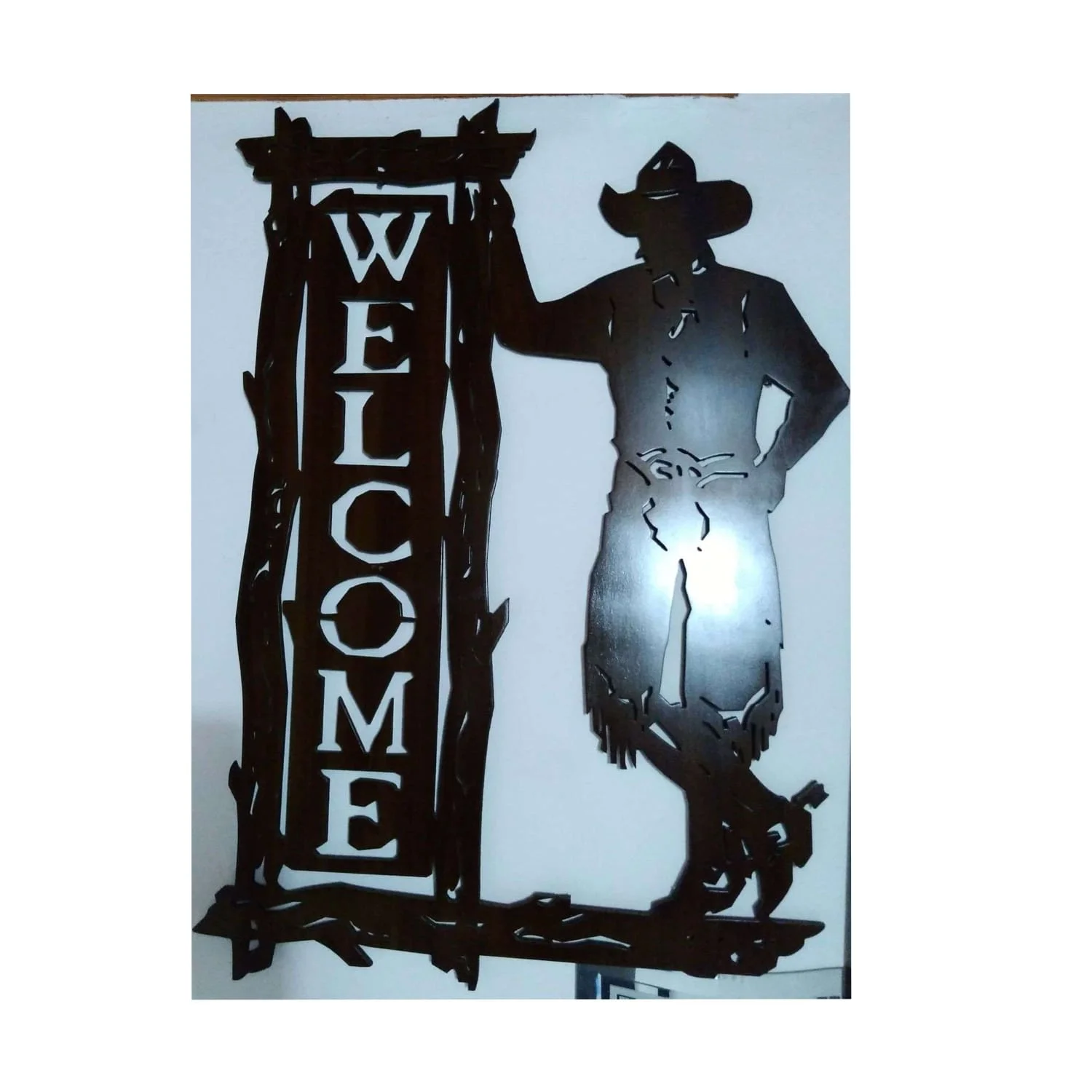 vaquero, bienvenidos. figura calada en madera.
